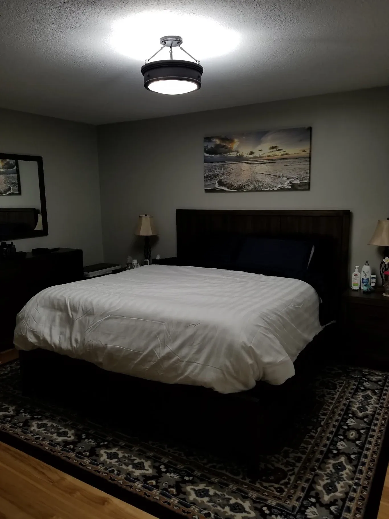 Ceiling light fixture installed in a rental unit bedroom